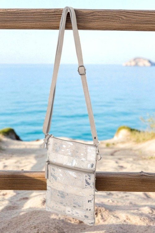 Pochette vintage tout cuir motif tacheté Cuir et daim cuir véritable Pochette vintage tout cuir motif tacheté Cuir et daim cuir véritable