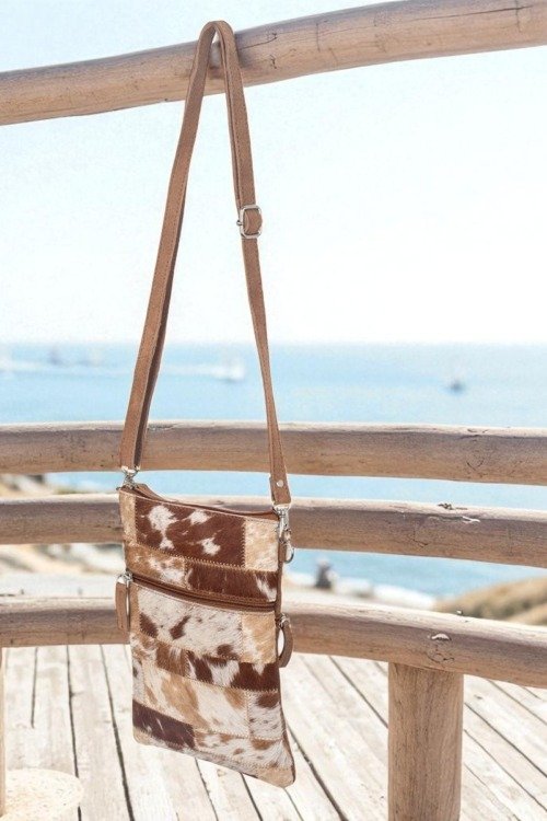 Pochette vintage tout cuir motif tacheté Cuir et daim cuir véritable